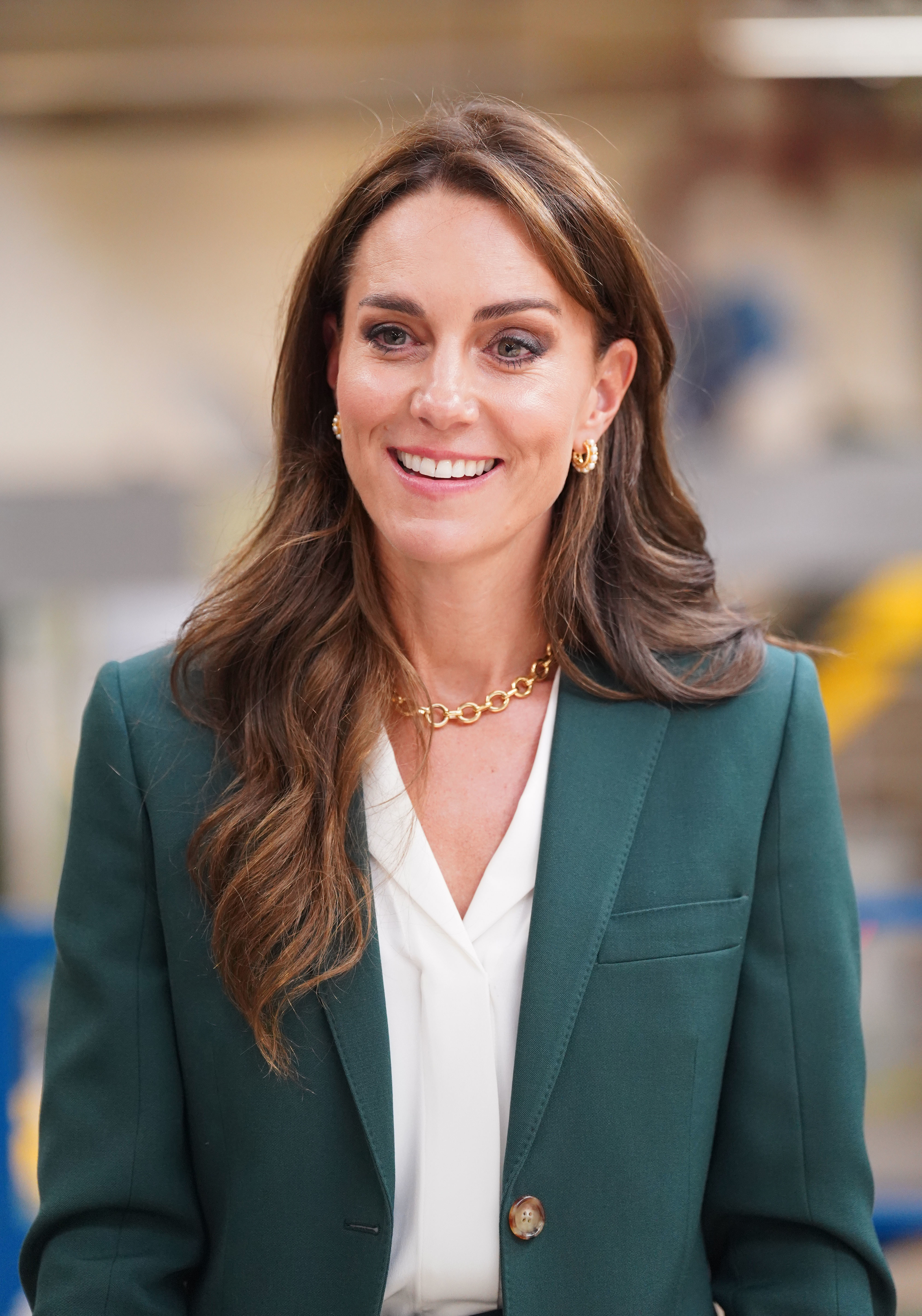 Kate has a history of wearing chic trouser suits, though.