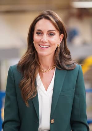 Kate has a history of wearing chic trouser suits, though.