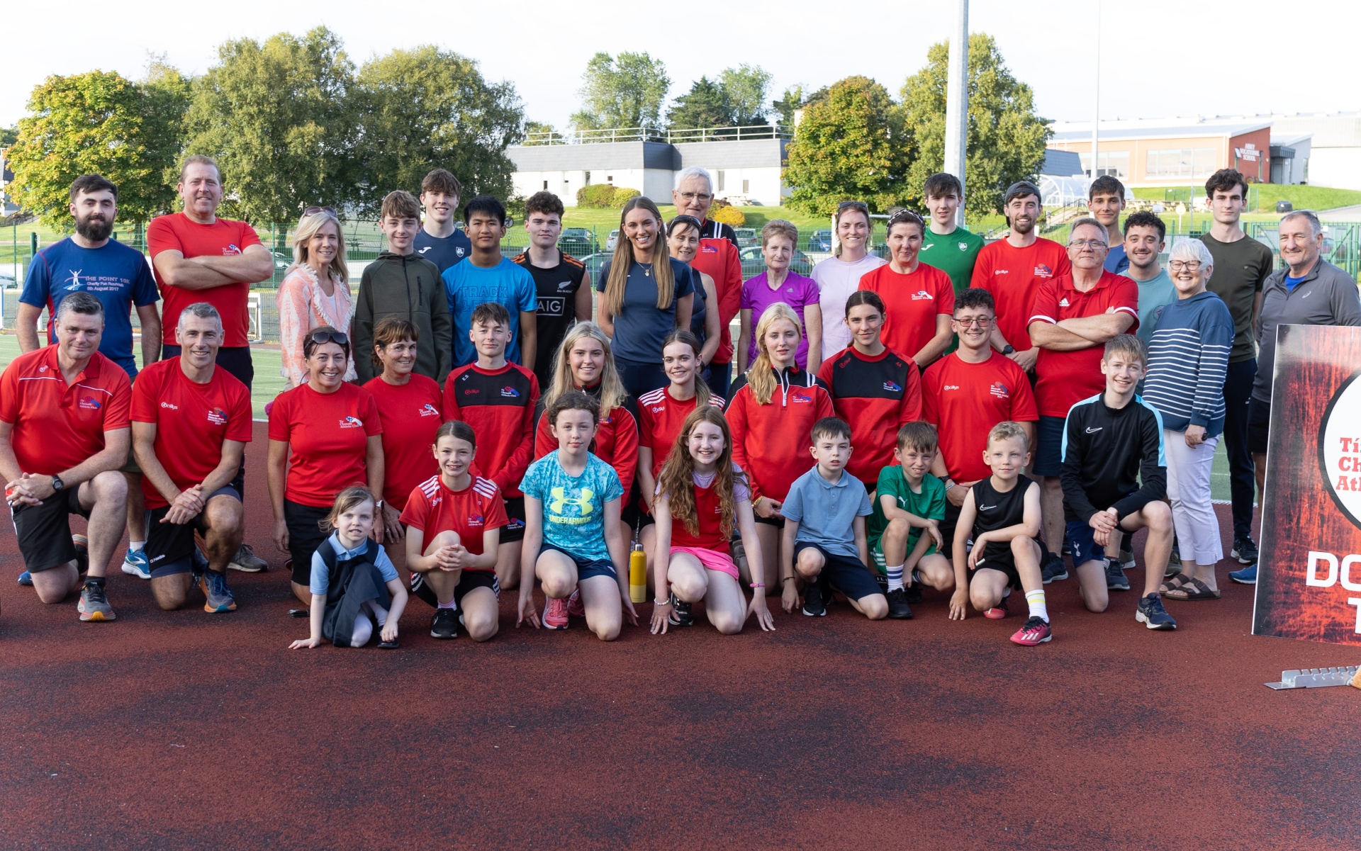 Click on the arrows to go through Joe Boland's photos  World Championship finalist Kelly McGrory was welcomed home by Tir Chonaill AC on Tuesday evening. The Laghey woman ran the third leg for the Ireland 4x400m women’s relay team that finished eighth at the World Athletics Championships in Budapest. Having defied the odds to reach the final, the Irish quartet of Sophie Becker, Roisin Harrison, McGrory and Sharlene Mawdsley clocked 3:27.08 to finish eighth having been just 0.12 of a second outside the Irish record when going 3:26.18 in their semi-final. McGrory is based now in Limerick, where she works with the Irish Wheelchair Association, but still runs for Tir Chonaill AC. “Don’t put a ceiling on yourselves,” McGrory told the young Tir Chonaill AC athletes. “There’s no reason some of you won’t be here in a few years time talking about how you’re an international athlete. “Don’t take your club and your coaches’ expertise for granted. You might think the big cities would be better, but what we have here is top class.” Among those present were McGrory’s former coach Eamonn Harvey and athletes including Tir Chonaill AC’s rising hurdles ace Fintan Dewhirst, the European U18 400m hurdles silver medallist in 2022. Laghey was brought to a standstill in those moments McGrory lined up at the National Athletics Centre. ‘I don’t think there was a dinner made the night of the final,” Tir Chonaill AC Chairperson David Doherty said. “What Kelly didn’t see was the buzz that people got from her just being there. “It was just the most exciting week to see one of our own on such a stage. “Dreams do come true. They don’t come true without hard work and those good days wipe away all the wet nights.” The support from home was not lost on McGrory. The 26-year-old said: “The amount of support was incredible. When we walked out in the stadium, it felt as if we may as well have been home. We got so, so much support. ”It’s great to have a club and a community behind you.”
