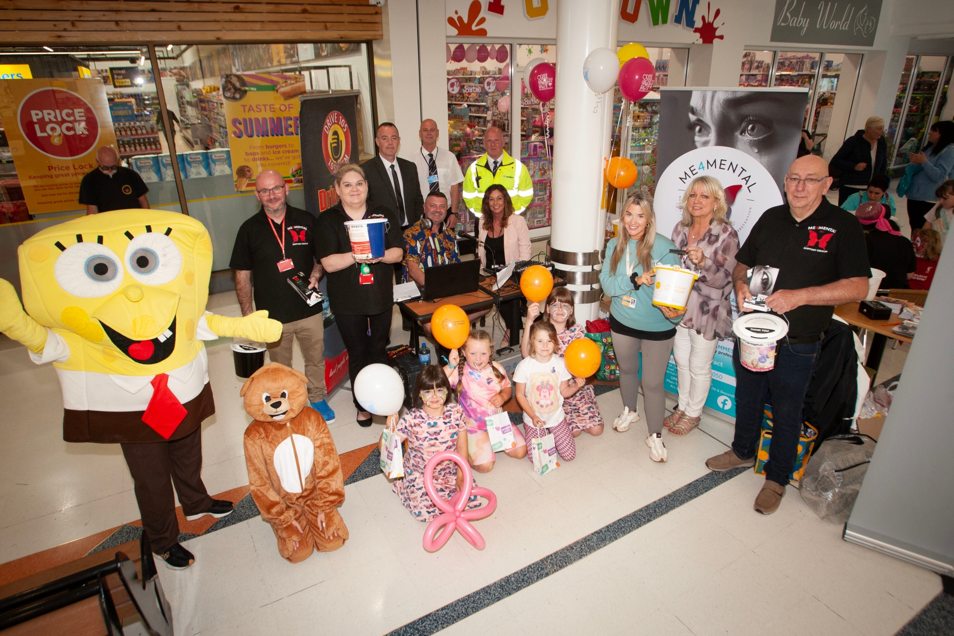 Group pictured at Friday's Lisnagelvin Shopping Centre's Annual Great Family Fun Day in aid of charities Cancer Fund for Children and ME4 Mental Health Support and Suicide Prevention. Included are centre manager Aishling Doherty, Joe Merrigan, assistant manager and Marian Harkin, Marketing Director, along with representatives from the two charities. 