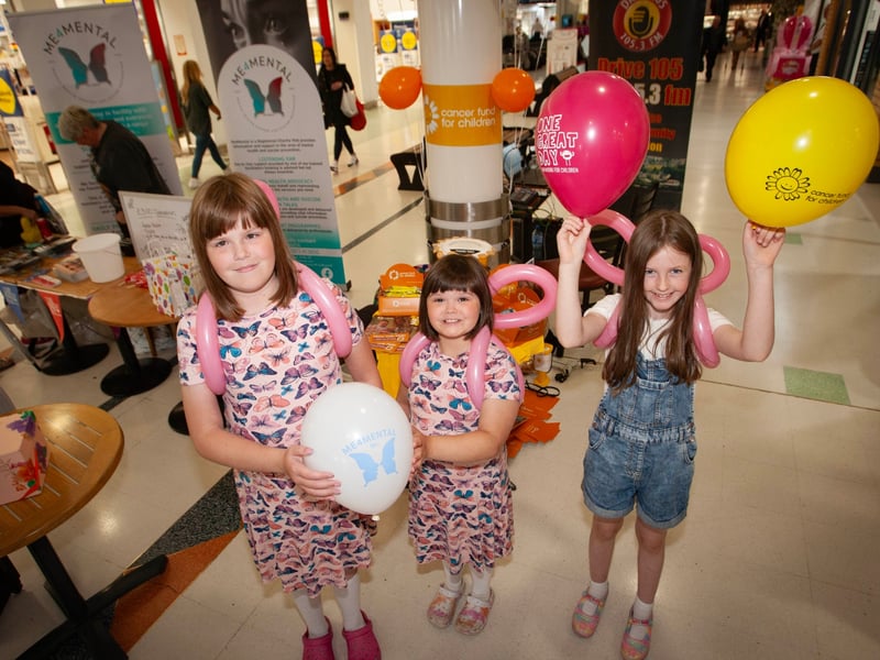 Enjoying the Lisnagelvin Shopping Centre's Annual Great Family Fun Day on Friday are Paris-Rose Maitland (11), Alexis Maitland (7) and Kayla Strain (8).