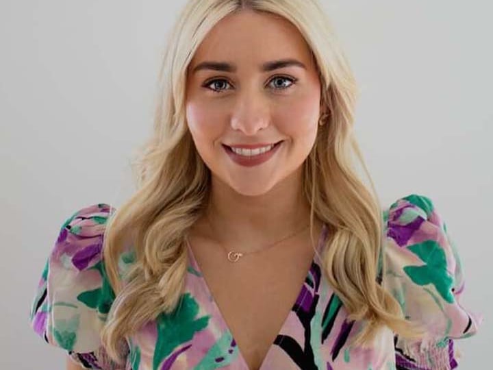 Longford Rose Grace Kemple Hi! My name is Grace, I am 23 years old and I am the Longford Rose for 2023. I have lived in Longford all of my life and I am so honoured to be representing my county in the Rose of Tralee International Festival. I am a Registered General Nurse and currently doing my Higher Diploma in Midwifery. I am studying this in Trinity College Dublin. As part of my studies, I also work in The Coombe Hospital. Becoming a midwife has always been my dream job, it is such a privilege to help bring new life into the world. I have delivered 31 babies so far; I still get emotional every time! I love being active. I enjoy the gym, pilates and walking my dog, Freddie. I am extremely close with my family, some of whom live in Tralee, and are very excited for August! I have been in Tralee many times during the Festival, but I am thrilled to be a part of it this year. I am really looking forward to the Festival, meeting new people and enjoying the experience with all of the other Roses!