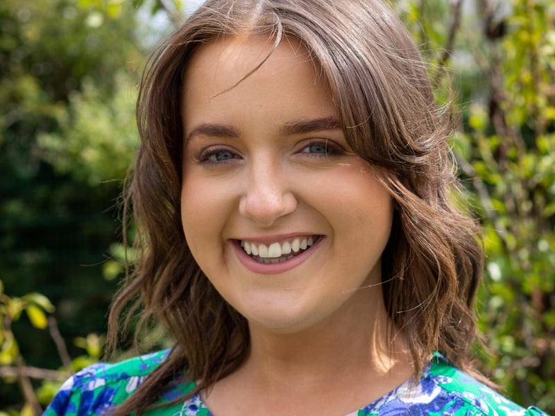 Wexford Rose Brónagh Hogan My name is Brónagh Hogan, I’m 25 years old and from Killegney, Co. Wexford. It is a dream come true to be the 2023 Wexford Rose. In 2019 I graduated with a Bachelor of Education from Mary Immaculate College and I teach in Kilrane NS. I have a grá for learning, which led me to pursue a Graduate Certificate in Autism Studies and a Masters in Special and Inclusive Education. One day, I hope to undertake a doctorate and become an educational psychologist. One of my other main passions in life is the stage. I have been performing since the age of four, from musicals to Scór na nÓg. Most recently I was involved in Wexford Drama Group’s production of The Father, which we were lucky enough to perform in The Abbey Theatre. I also love to travel, my most memorable experience being volunteering with the Badjao tribe in the Philippines. I am overwhelmed with the support the people of Wexford have shown to me during my Rose journey and I am beyond excited for the adventures that lie ahead as the Wexford Rose.