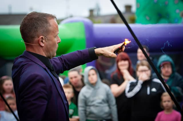 Magician Jack Wise performing one of his tricks at Bull Park during Feile 23 on Tuesday night.