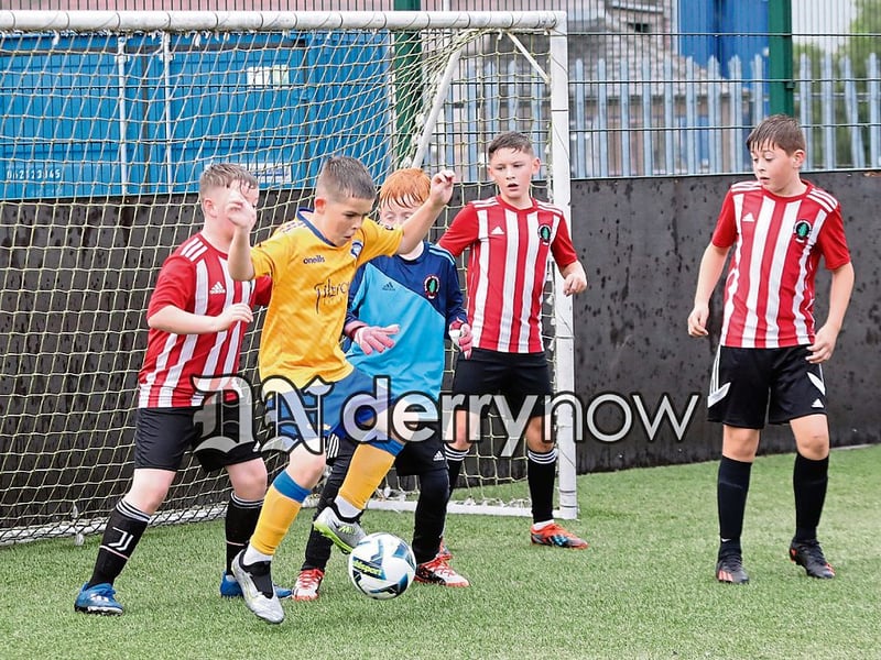 Goalmouth action from the Ballymoor v Trojans game in the Padraig Barton Cup.