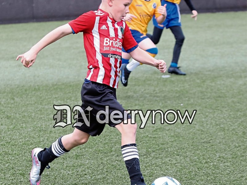 A Ballymoor player pushes forward with the ball against Trojans in the Padraig Barton Cup. (Photos - Tom Heaney, nwpresspics)