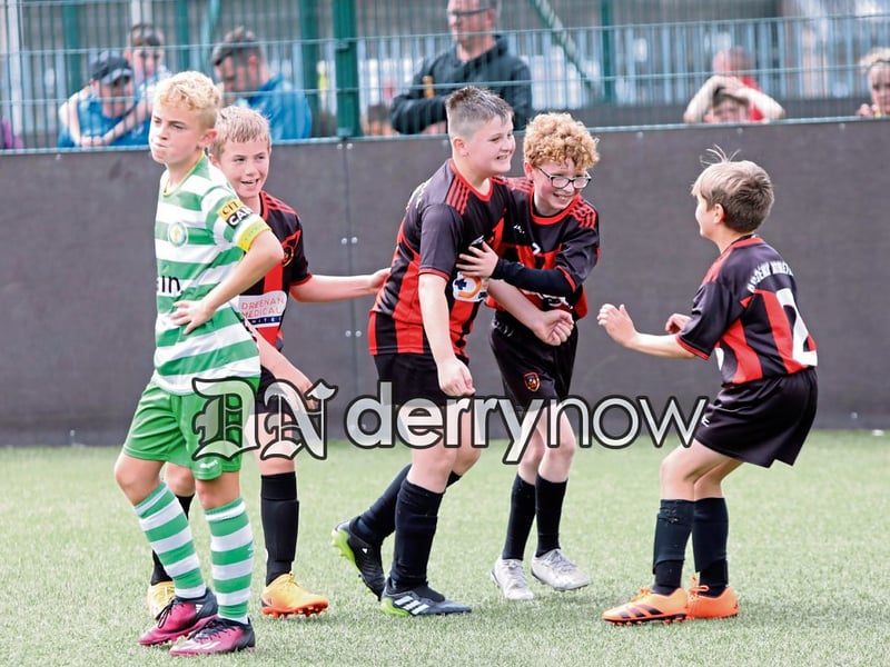 Phoenix's Aidan McMonagle (top goalscorer of the tournament) celebrates his goal with teammates in the Padraig Barton Cup final, Phoenix Athletic v Top of the Hill Celtic, held at Bay Road Soccer. (Photos - Tom Heaney, nwpresspics)