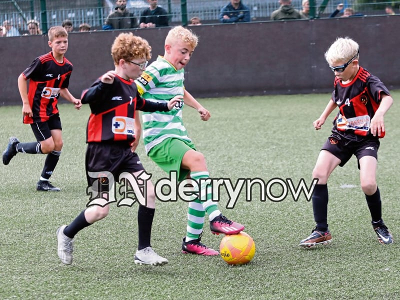 Action from the Padraig Barton Cup final, Phoenix Athletic v Top of the Hill Celtic, held at Bay Road Soccer. 