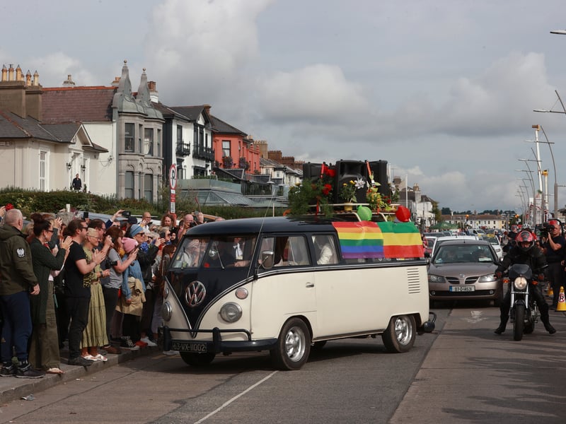Visitors from across the world along with locals, campaigners and fans, wept and danced together as a Volkswagen camper van played some of her most powerful tracks including Nothing Compares 2 U.