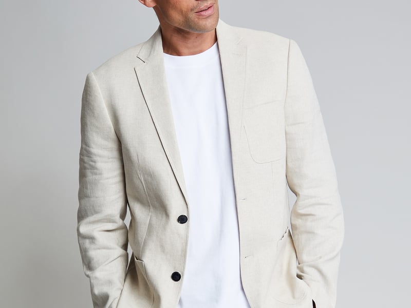 Hawes and Curtis Brown Linen Shirt Jacket, £179 (was £199); White Mercerised Cotton T-shirt, £29.50; Natural Herringbone Tailored Linen Trousers, £150; Light Brown Suede Leather Casual Loafers, £99 (were £129)