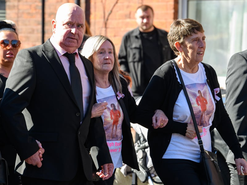 Rachel's dad Mick and mum Deb lead the funeral procession to St Joseph's Church