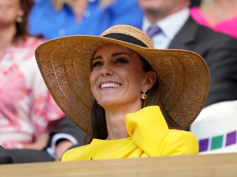 To really channel summery energy, she accessorised it with a classic wide brimmed straw hat to watch the tennis from the Royal Box.
