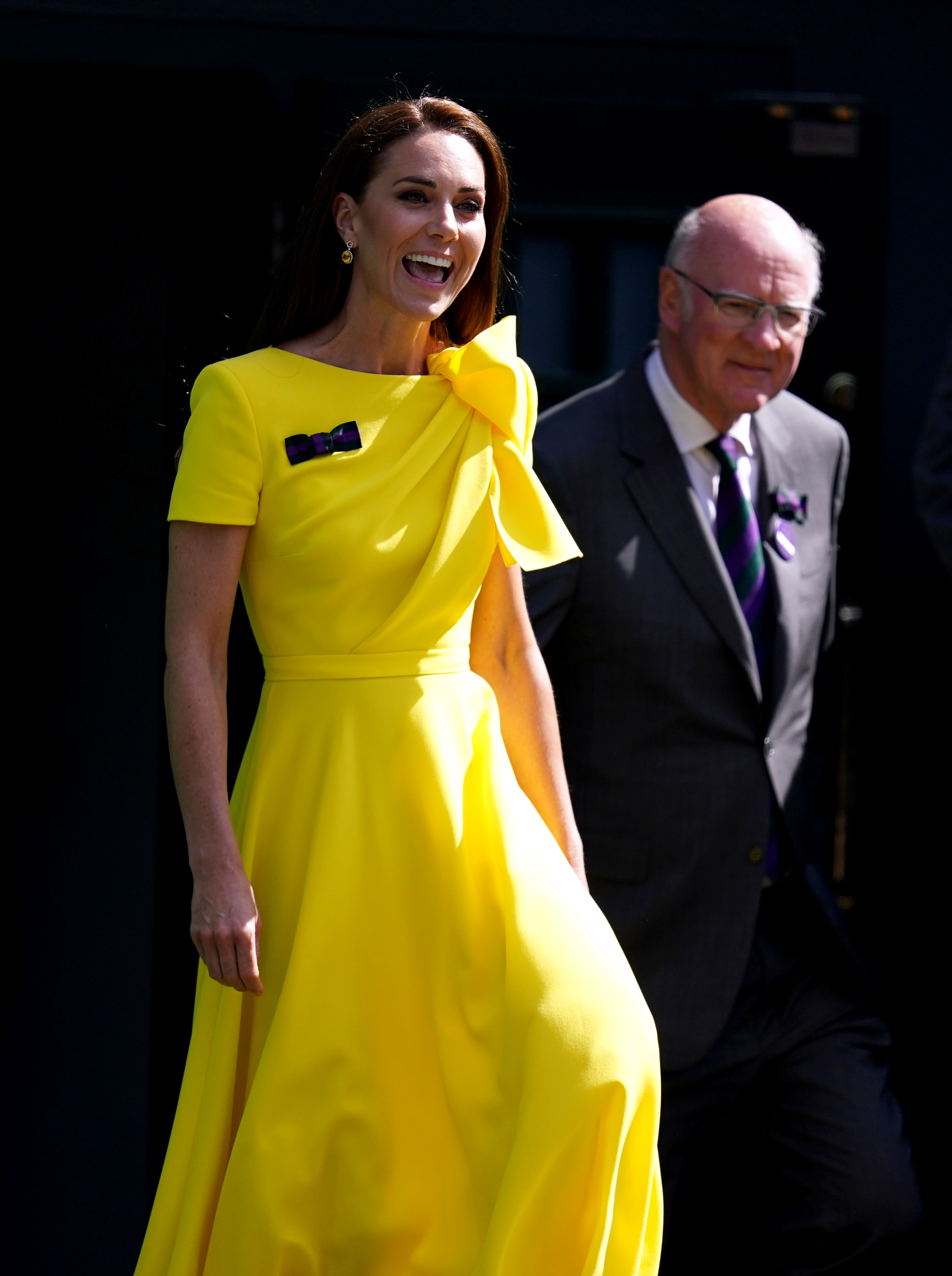 Even better, William coordinated with his wife in a pale blue shirt – paired with a chic light grey jacket.