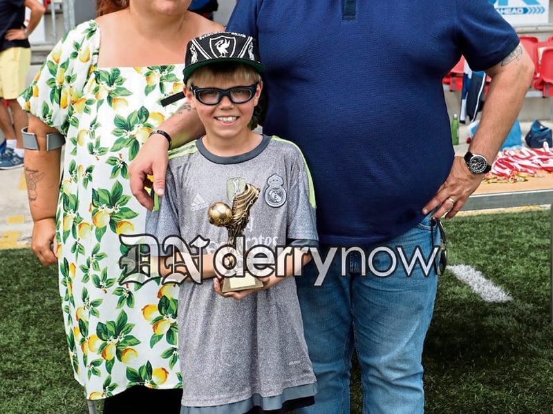 Player of the Tournment Eglinton Eagles keeper Ben Greenwood with Aaron's parents' Jim and Susie Dohert. (Photos - Tom Heaney, nwpresspics)