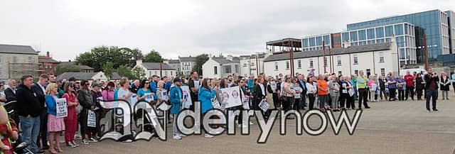 A large crowd attends The Community Day of Action held in Ebrington Square.
