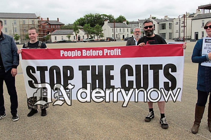Cllr Shaun Harkin and People Before Profit stand together at the Community Day of Action held in Ebrington Square.