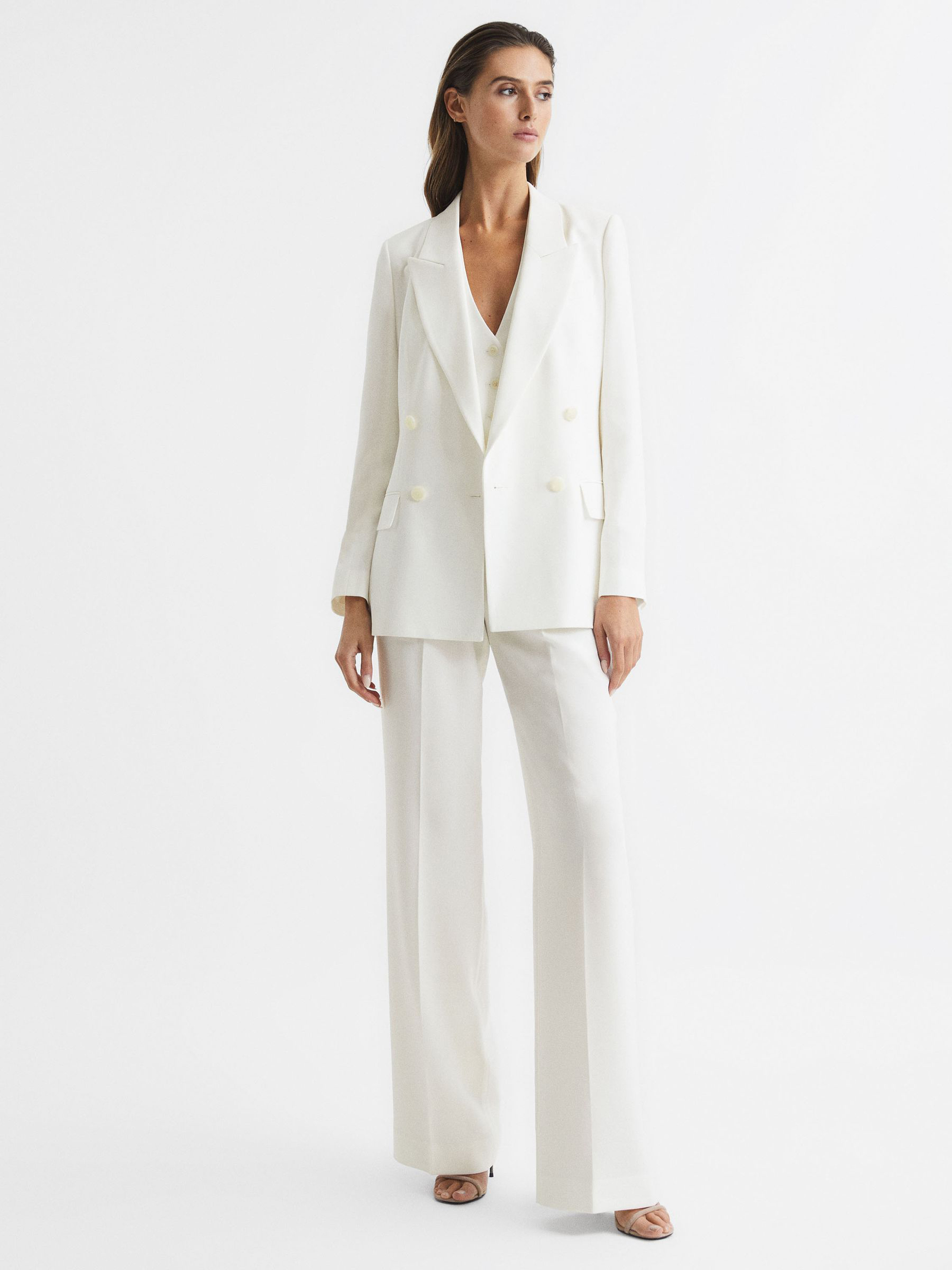 From three-piece numbers to jumpsuits, here’s our pick of the best tailored bridalwear for your big day…