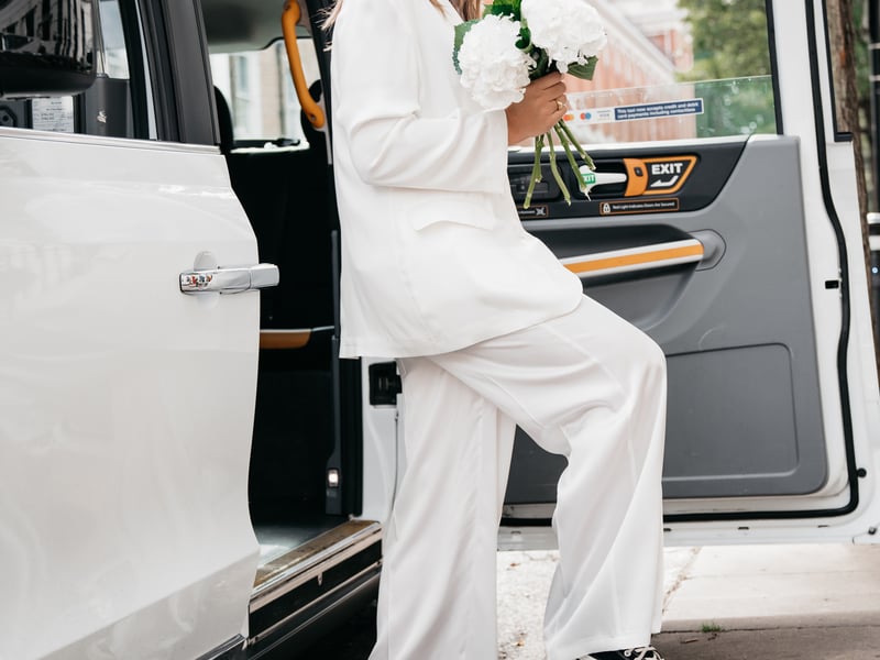 Nadine Merabi Margot White Blazer, £275; Nicole White Top, £85; Margot White Trousers, £190 (shoes, stylist’s own)