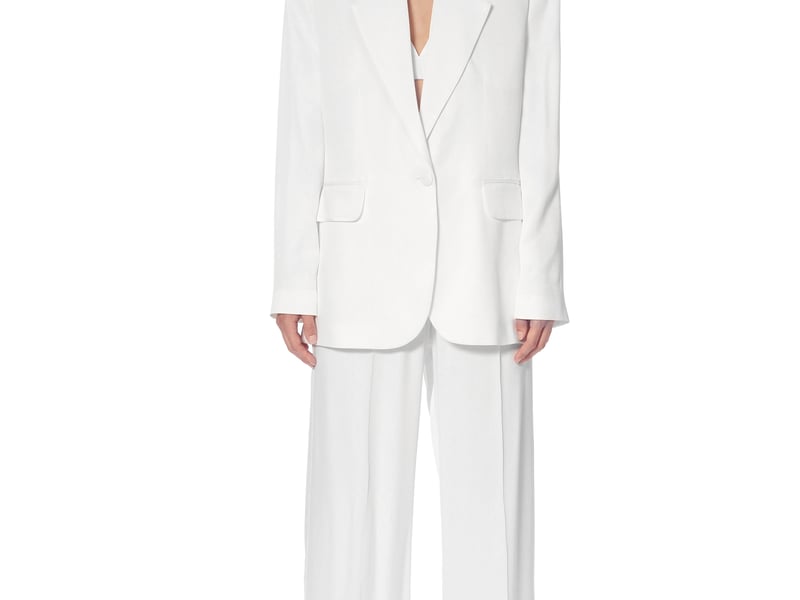 The Summer Edit Gigi Opal Silk Jacket, £225; Lexi Opal Sports Luxe Silk Trousers, £175 (shoes, stylist’s own)