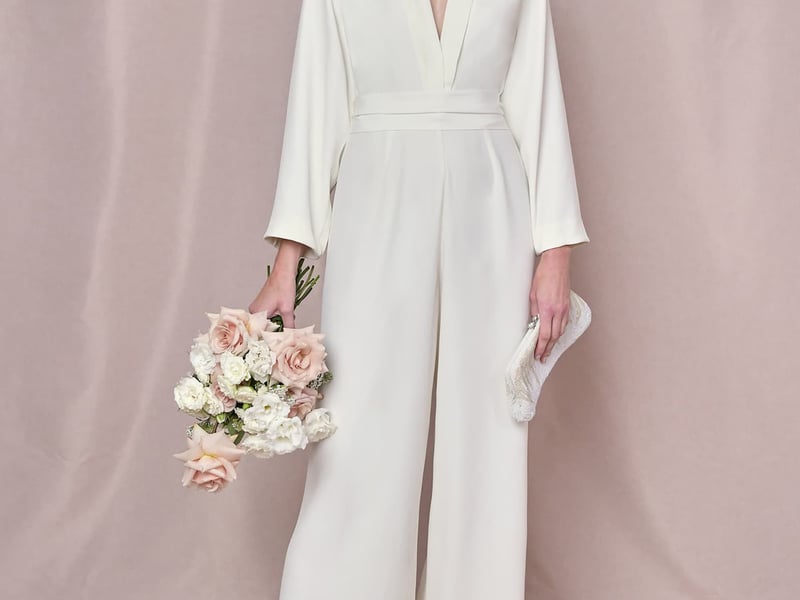 Reiss Tatum Crepe Double Breasted Blazer, £298; Tatum Tailored Waistcoat, £158; Tatum Crepe Wide Leg Trousers, £198