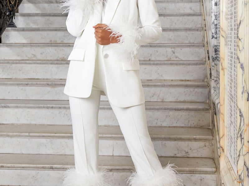 Rixo Emilia Silk Tuxedo Jumpsuit, £565 (bag, stylist’s own