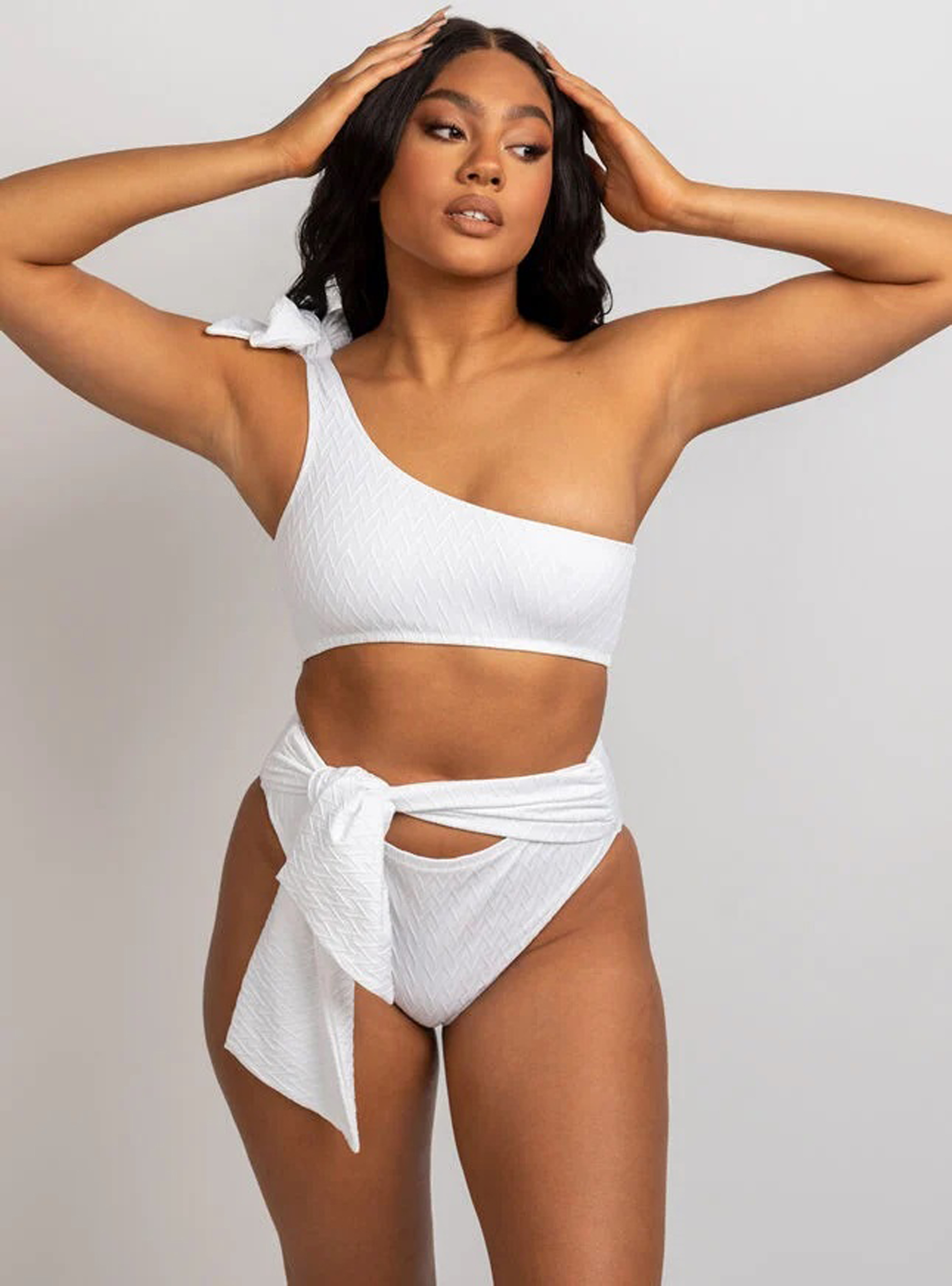 Go for Grecian glam with a white one-shoulder bikini or jazz it up with a colourful print.