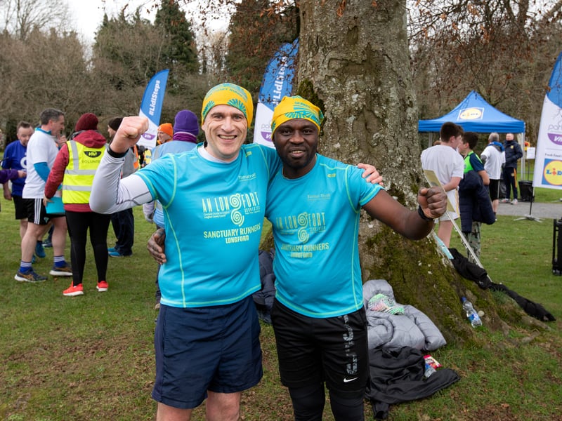 Caption: Longford parkrun played host to the Kiernan Steel Longford Operation Transformation 5k last Saturday morning, March 4 in The Mall Albert Reynolds Peace Park and pictured are Gavin McHugh alongside Ojo Wolex. Gavin is a representative of The Sanctuary Runners, working with people in direct provision, helping them with ease into the community. It is his 5th year with the Sanctuary Runners Longford and parkrun Picture: Michael Croghan Photography
