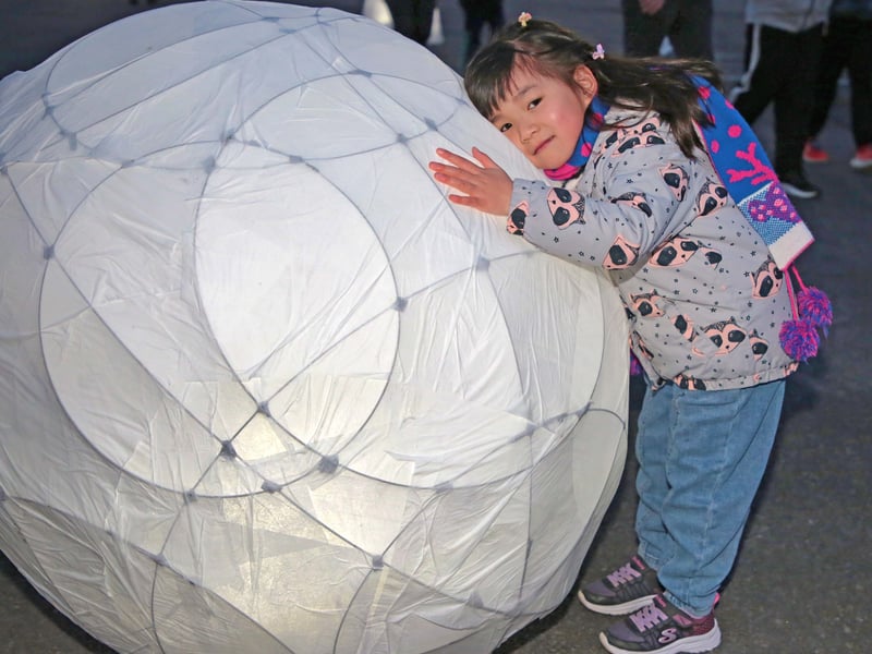 Caption: Jessica Huang with one of the lantern displays at the Longford Lights Festival last weekend in Connolly Barracks