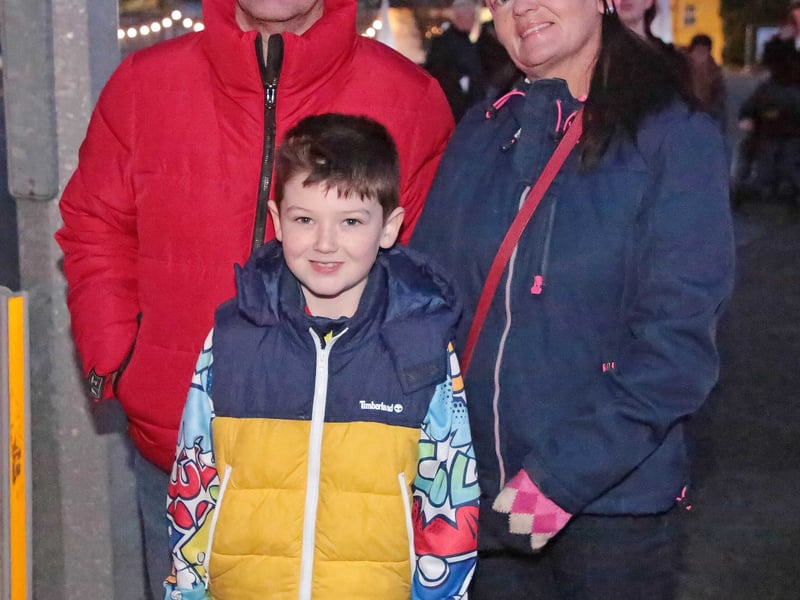 Caption: John, Fidelma and Joe Rooney