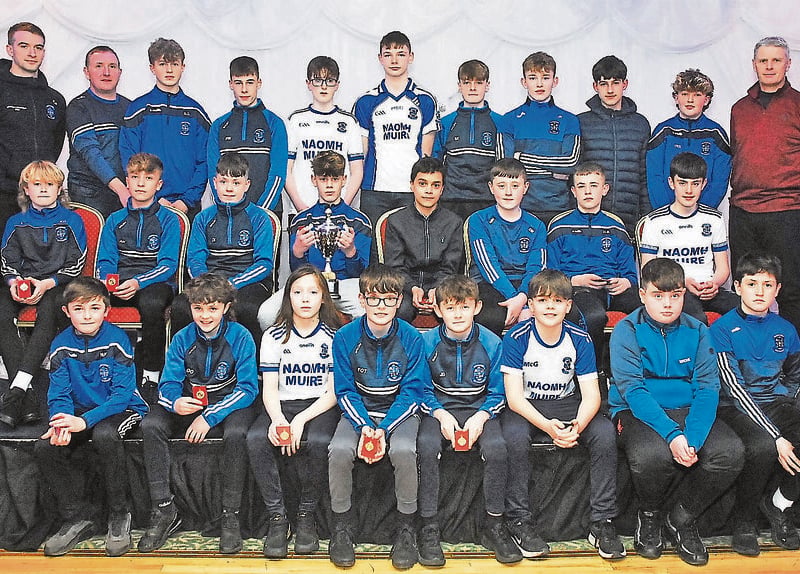 Under 13 county champions were presented with their medals by Conor Farrell. They are pictured with their coaches Shane Kelly and Donal O'Grady.