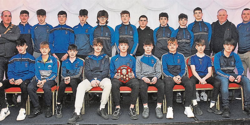 Under 15 boys who won the Division 3 league were presented with their medals by Mark Diffley and are pictured with their coaches Brian Duignan, Tony Keane and Darren Glancy.
