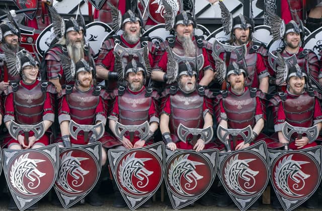 The march is led by the Guizer Jarl, or Viking chief, who leads his Jarl squad on the march and culminates in the evening with a torch-lit procession and a replica longboat being set alight.