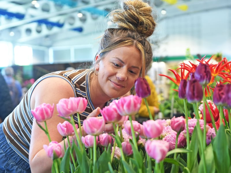 Rachel Pearson from Leeds views some of the blooms on display in the Grand Floral Hall.