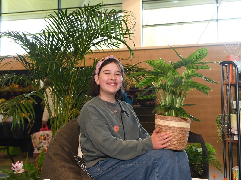 Pictured 11-year-old Molly Dixon-Penn with her  display in the Grand Floral Hall.