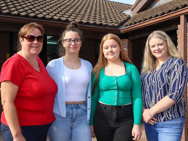 Rathdowney’s Orlaith Coiley with Lucy O’Connor from Durrow celebrate collecting their Leaving Cert results from Coláiste Mhuire Johnstown on Friday morning. They both want to study chemical engineering at UL and are pictured with their mothers Janet Coiley (left) and Margaret O’Connor. Photo Christine Tobin