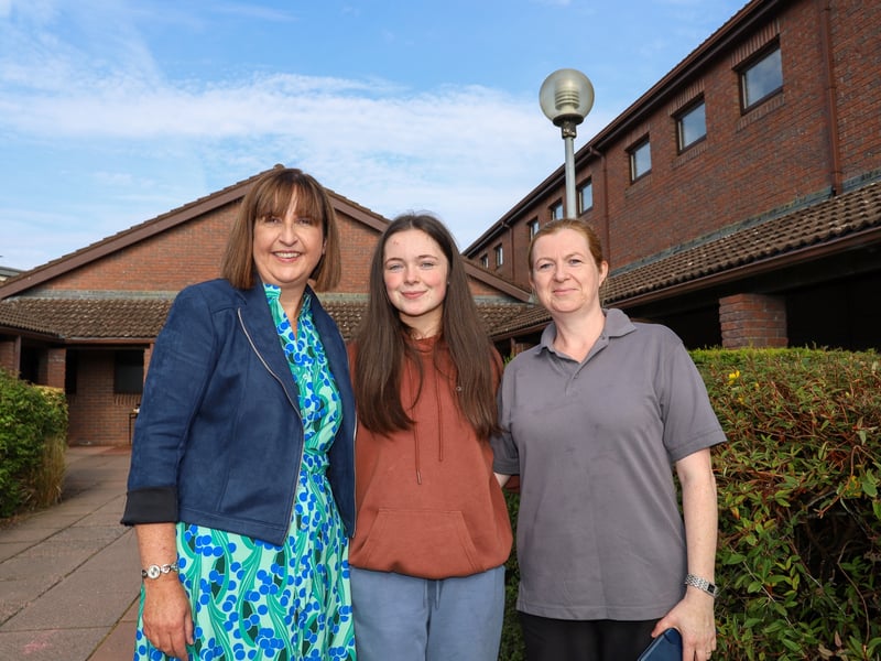 Angela Conroy, Deputy Principal of Coláiste Mhuire Johnstown congratulates Aoife Ryan on Friday morning as she collects her Leaving Cert results with her mother Amanda Ryan. Photo Christine Tobin