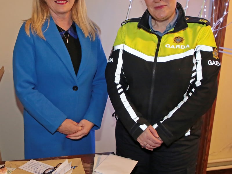Caption: Breda Greaves and Garda Emma Kiernan at ‘The Mulligan Sisters Christmas Concert by Candlelight’ in St Matthew’s Church, Ballymahon last Sunday evening which was organised as part of the 'Operation Blue Light Santa' 2022 fundraisers Pictures: Shelley Corcoran