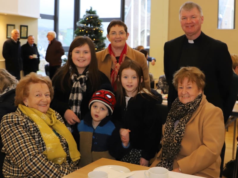 Parishioners - Maura Caldwell, Caroline Martin and her grandchildren Josh Martin, Alaia and Evie Carron and Maureen Slevin together with Fr Niall Coll.