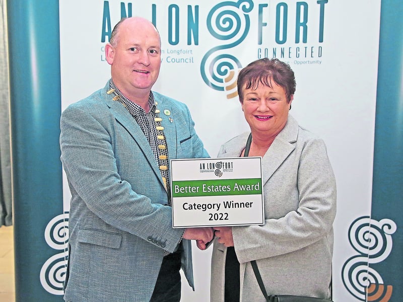 Caption: Longford County Council Cathaoirleach Cllr Turlough McGovern making a presentation to Sarah Murtagh, Ballinalee