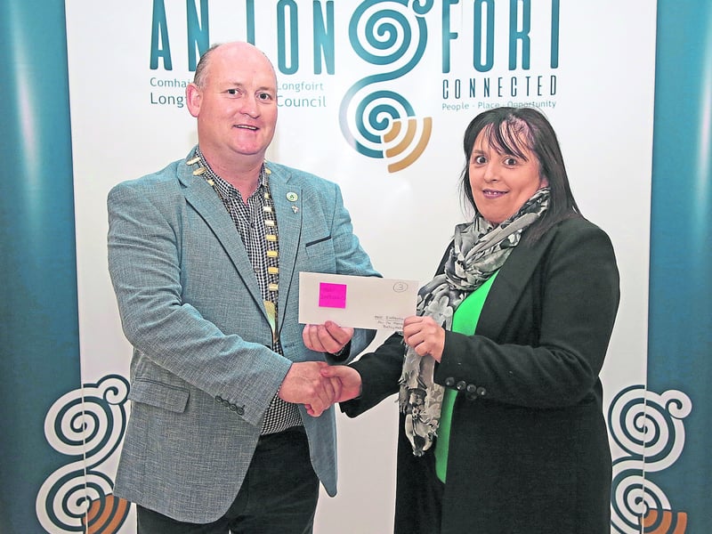 Caption: Longford County Council Cathaoirleach Cllr Turlough McGovern presenting Most Improved award to Liz Masters, Ballymahon