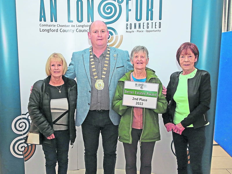 Caption: Cathaoirleach Cllr Turlough McGovern with Noelle Scott, Ann Blake and Ann Cannon, Devine Crescent, Edgeworthstown, second place in the Large Estate Category 