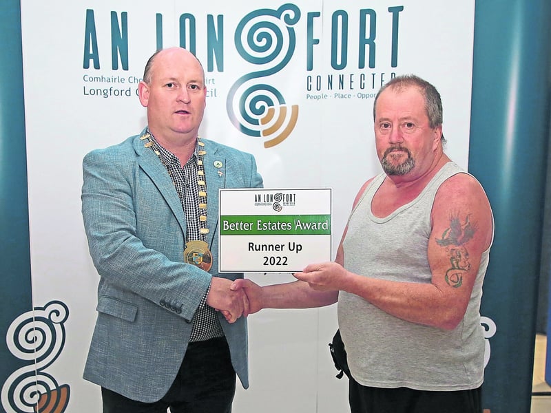 Caption: Longford County Council Cathaoirleach Cllr Turlough McGovern presenting category runner up award to Joe McCrann, Springlawn 