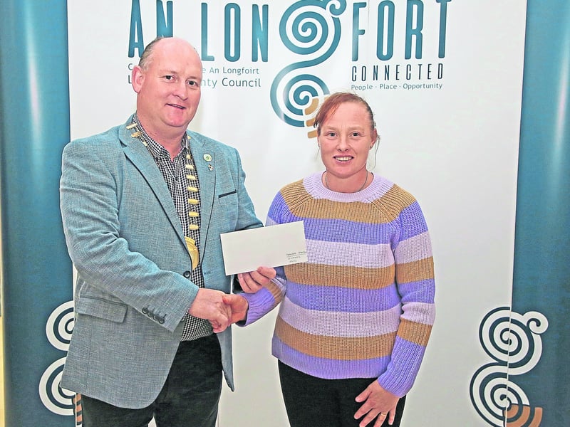 Caption: Longford County Council Cathaoirleach Cllr Turlough McGovern making a presentation to Regina Reynolds, St Emer's