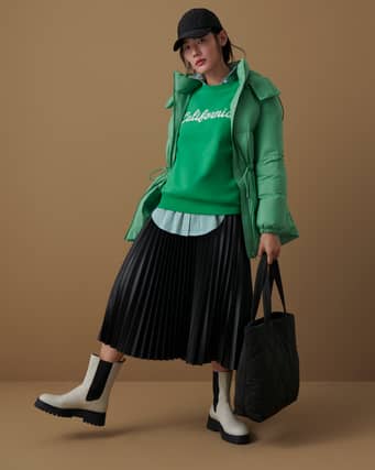 “Whether that’s worn on top of a white blouse, or pairing it with complementary – or even clashing – colours, such as orange and purple – a psychedelic combination.”