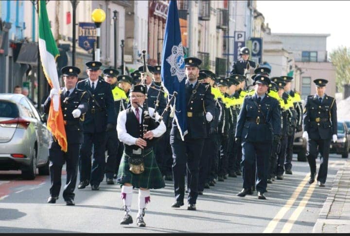 On the 1st October 2022 a series of events took place in Carlow to mark the centenary of the arrival of the first Gardai to Carlow. On the 28th September 1922 a party of three sergeants and 28 Gardai arrived at the railway station in Carlow Town from where they marched to the town's barracks on Tullow Street. CLICK ON THE ARROWS ABOVE TO SEE MORE PHOTOS Photo: Garda Síochána Waterford/Kilkenny/Carlow This march was re-enacted by the current station party and was headed by a lone piper and led by Assistant Commissioner Paul Cleary, Chief Superintendent Padraig Dunne and Superintendent Aidan Brennan. The parade marched to the old station and continued past the new Garda Station to An Gairdín Beo where commemorative medals, coins and certificates were presented to all serving members, retired members, Garda Staff and retired Garda Staff. Presentations were also made to the families of our deceased colleagues. A great occasion involving serving and retired colleagues, all of whom have played a part in the wonderful relationship between Carlow Gardai and the local communities.