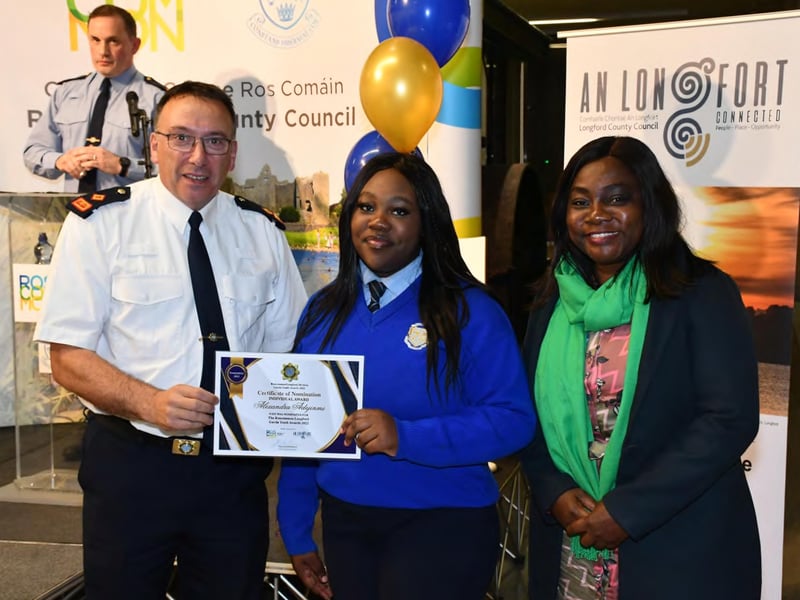 Caption: Superintendent Seamus Boyle with Individual Award nominee Alexandra Adejinmi and Cllr Uruemu Adejinmi