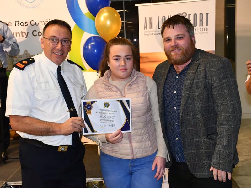 Caption: Superintendent Seamus Boyle with Individual Award nominee Carly Nevin and Martin Nevin