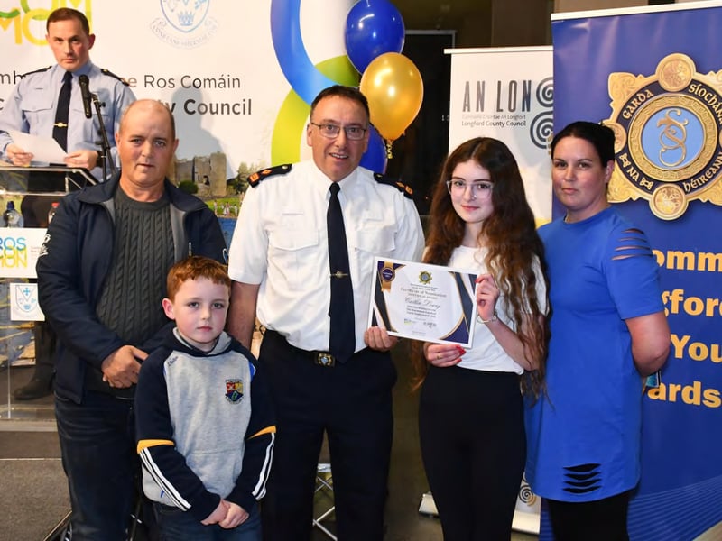 Caption: Superintendent Seamus Boyle with Individual Award nominee Caitlin Lowry