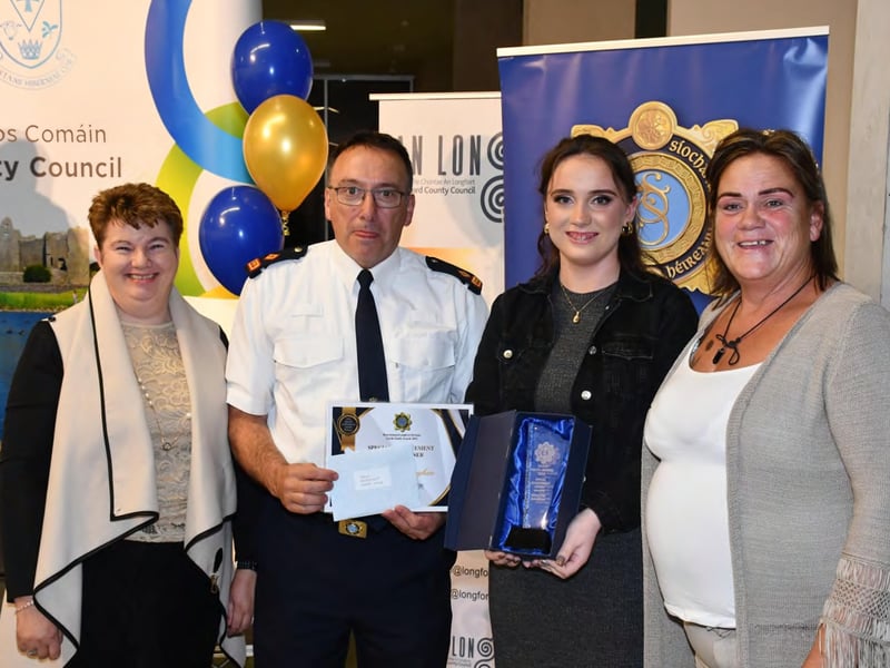 Caption: Longford's Geraldine Maughan accepting the Special Achievement Award with Garda Superintendent Seamus Boyle
