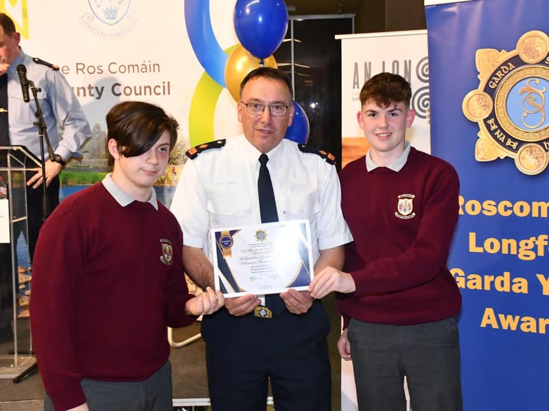 Caption: Carl Schiferli and Eoghan Duncan of Ballymahon Vocational School who were nominated for a Community Safety Award pictured with Superintendent Seamus Boyle